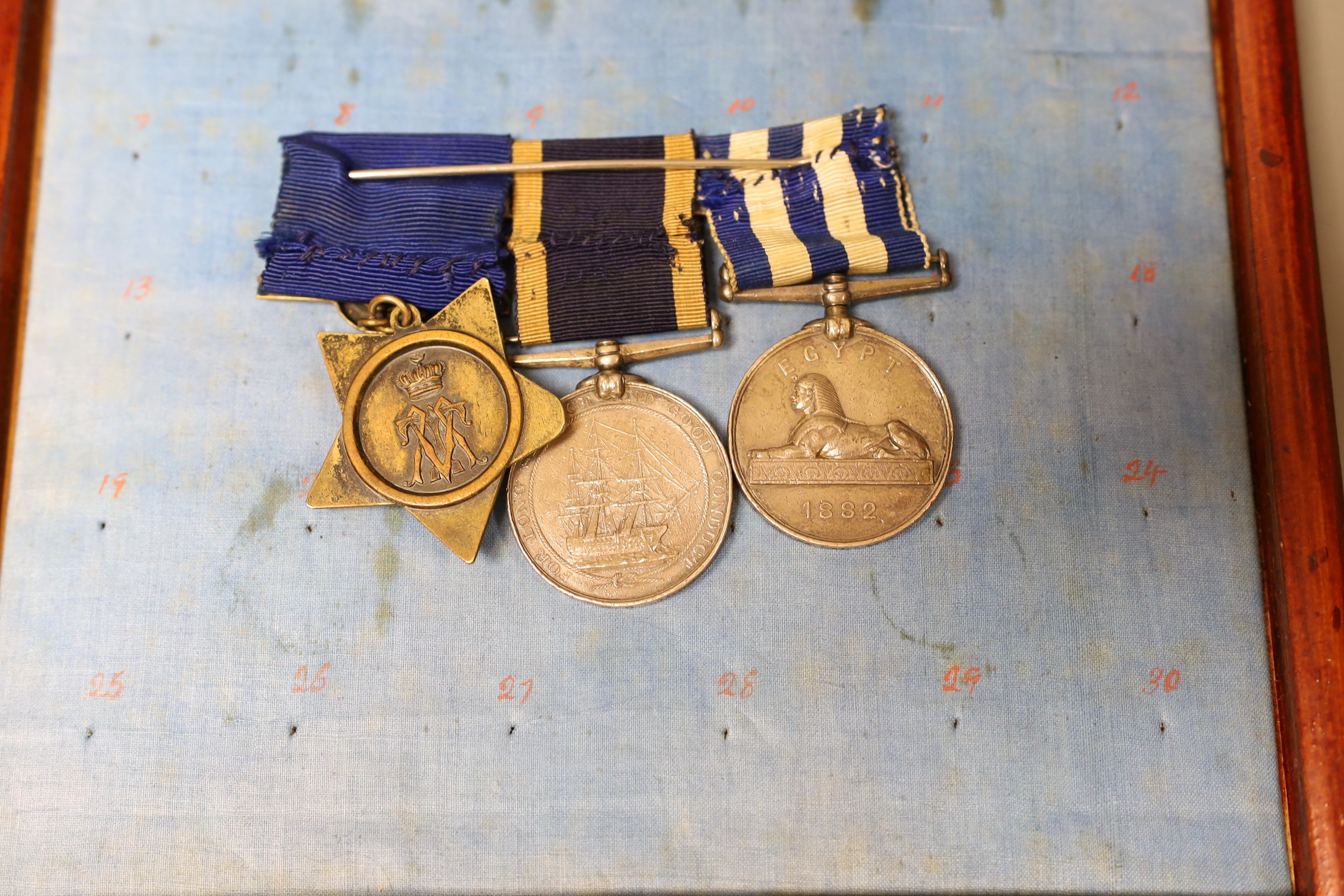 Egypt 1882 medal, Khedive star and Naval Long Service and Good Conduct medal to Wm. Barratt Sergt. R.M. HMS Coquette